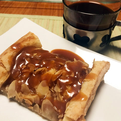 Slice of Apple Tart with rich Caramel Sauce
