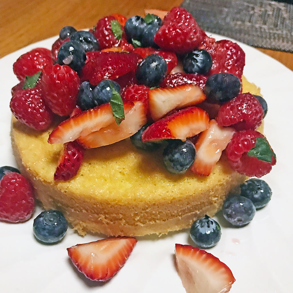 Lemon Sponge Cake with Mixed Berries and Honey Whip Cream